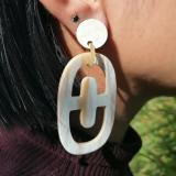 Theta earrings made of horn